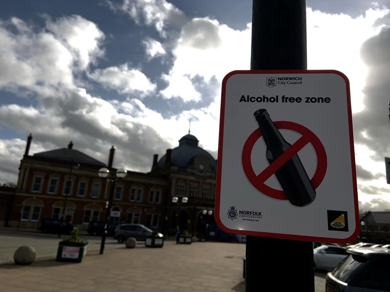 Alcohol free zone sign with a bottle crossed out 