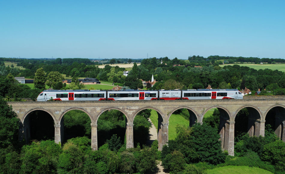 A new Greater Anglia train crosses the Chappel Viaduct at Chappel & Wakes Colne 