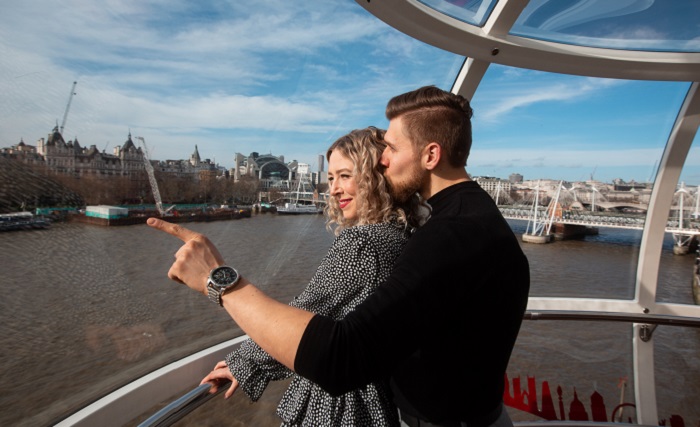 A couple enjoying views from the London Eye