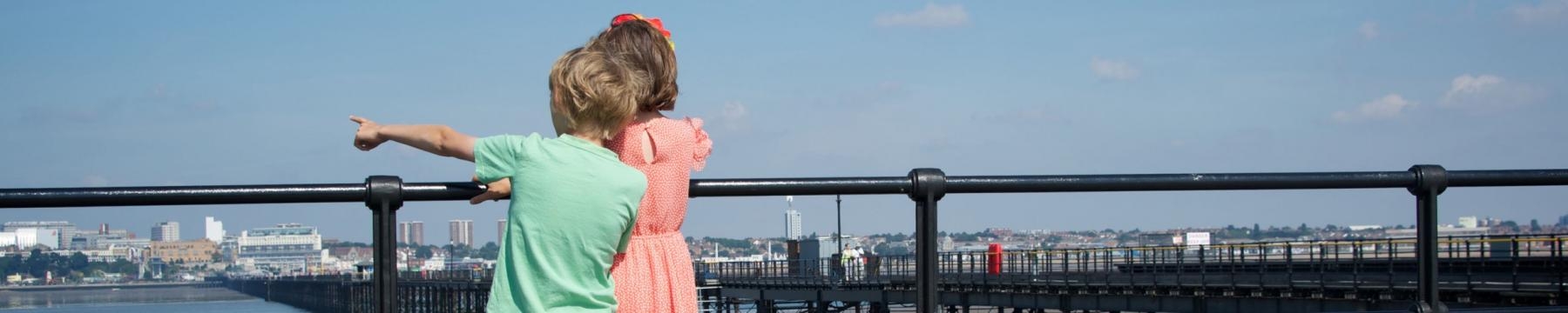 Children looking out from Southend pier