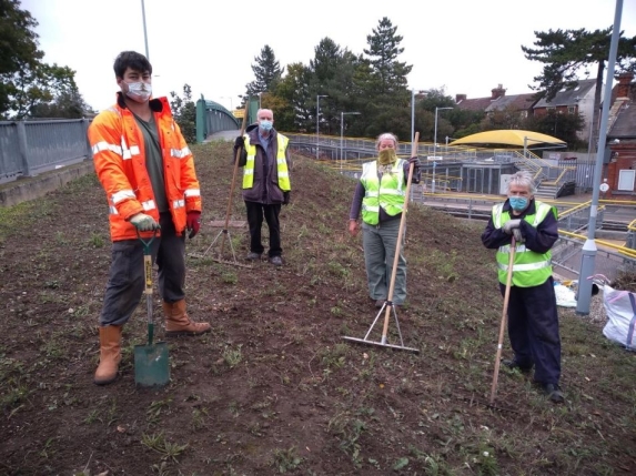 Community turns patch of land into a wildlife haven at Derby Rd Station
