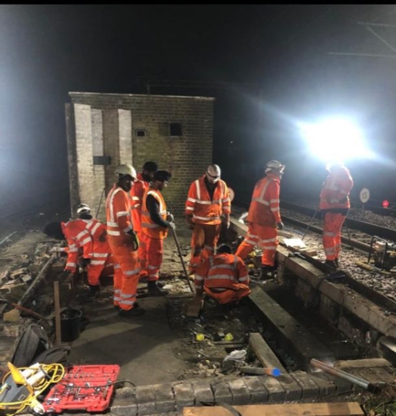 Building foundations being recovered by workers during the night
