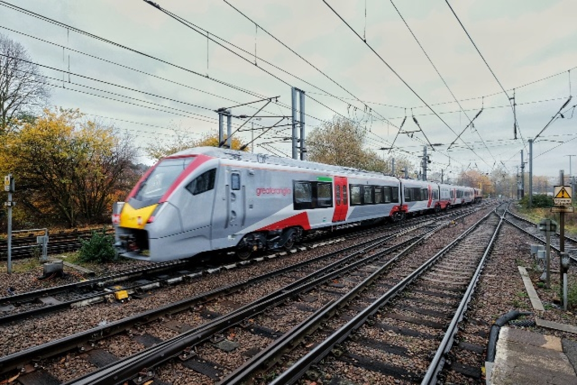Brand new Greater Anglia Stadler train on a curve leaving Ipswich station