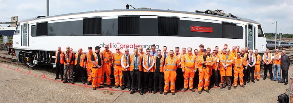 Depot staff in 2014 with a train named crowned point
