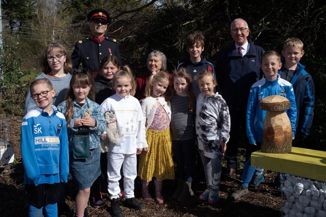Above: Children of Wix & Wrabness Primary School with Nigel Spencer MBE, Deputy Lord Lieutenant of Essex, station adopter and local resident Julia Prigg and Luke Dixon of the Bee Friendly Trust. Credit: Bee Friendly Trust.