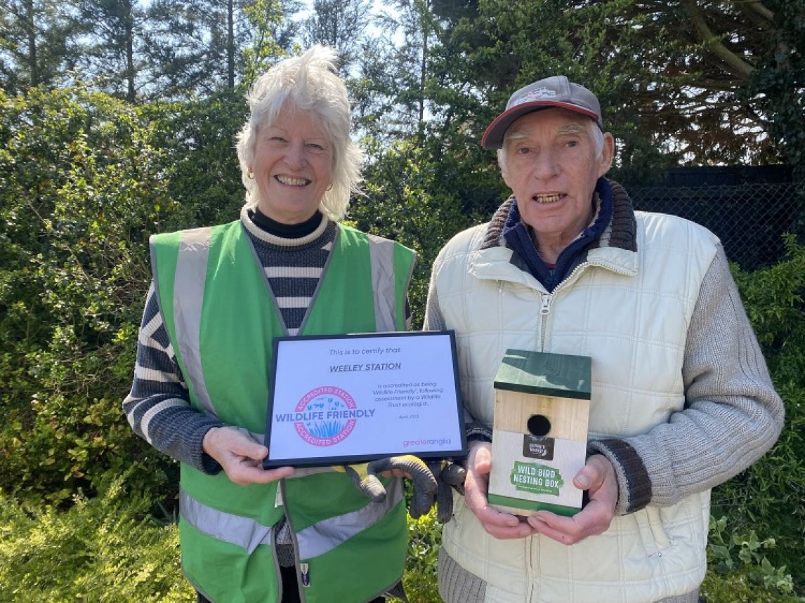 Weeley In Bloom volunteers with their accreditation. 