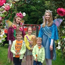Kids with fairies in a garden